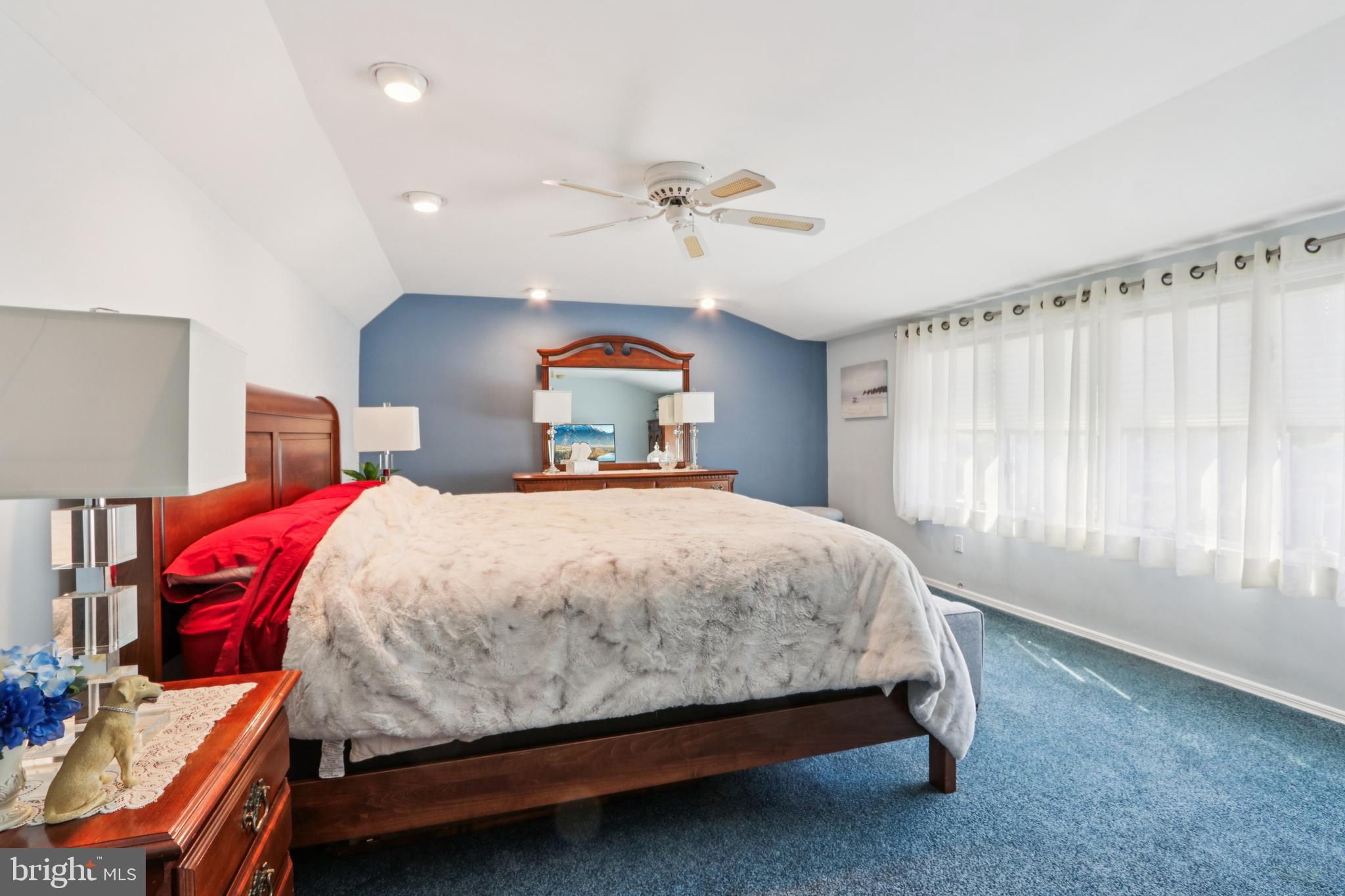 102 Partree Road Cherry Hill, NJ 08003 - Photo 49 of 87 a bed sitting in a bedroom next to a window