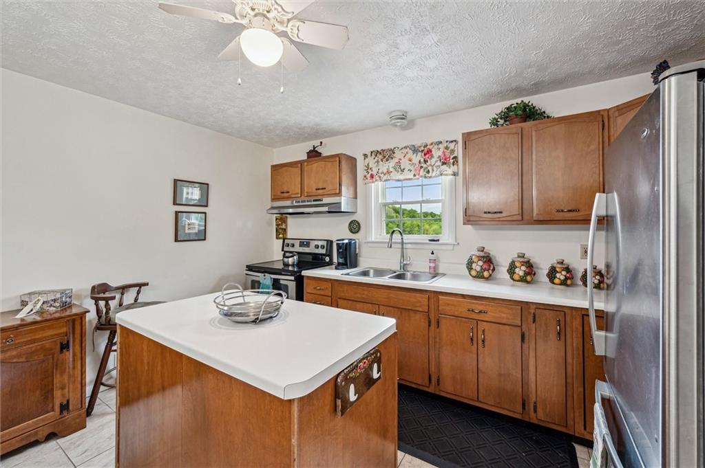 73 Hartman Road Marion Center, PA 15759 - Photo 10 of 42 Island with dishwasher