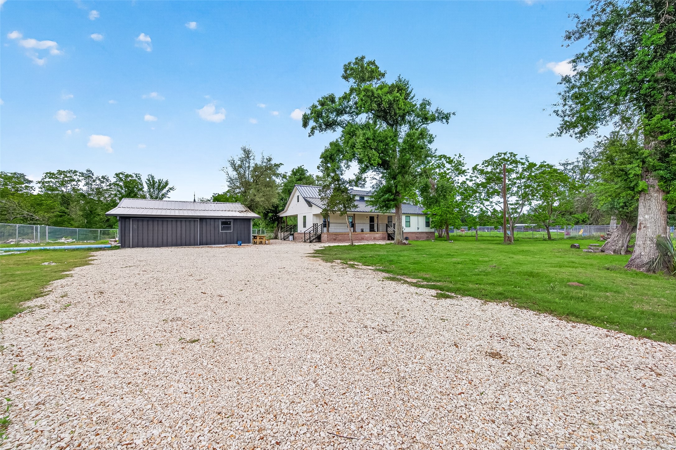 803 County Road 772 Damon, TX 77430 - Photo 3 of 50 a view of a house with a yard
