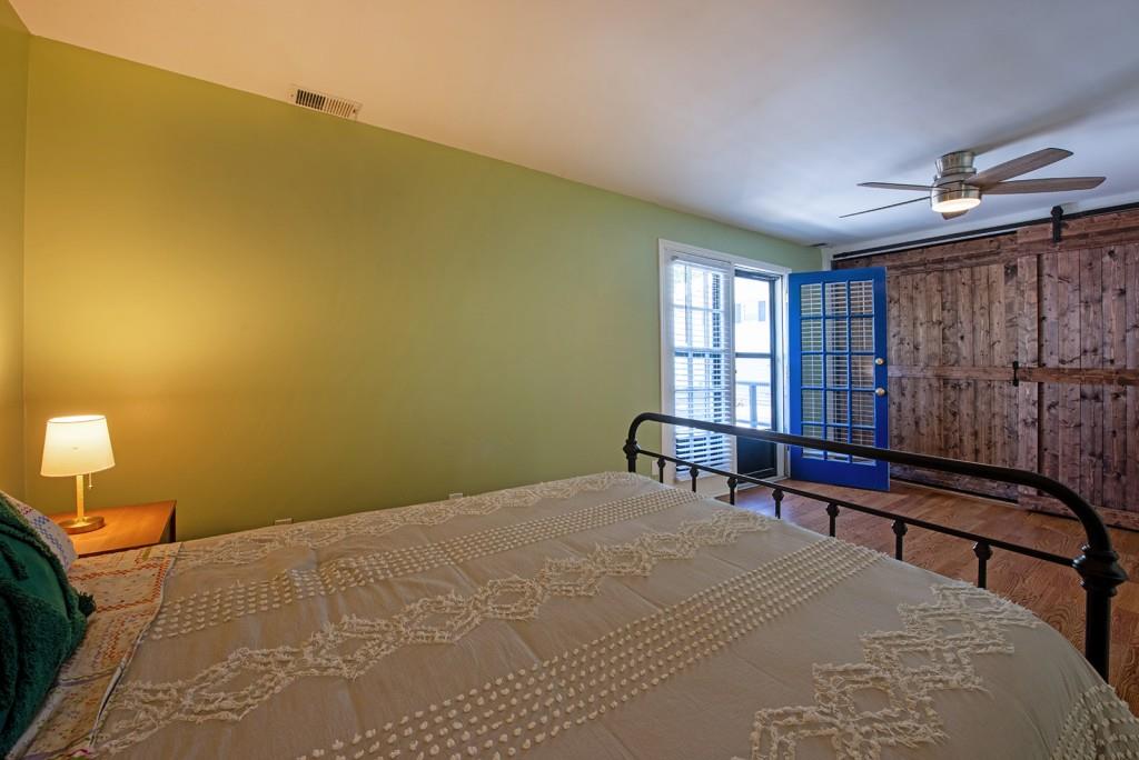 408 Sycamore Drive, Unit D Decatur, GA 30030 - Photo 17 of 63 a bedroom with a bed and a window