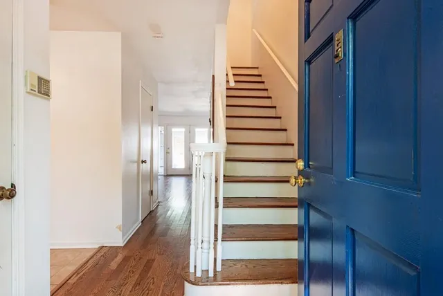a view of entryway with wooden floor