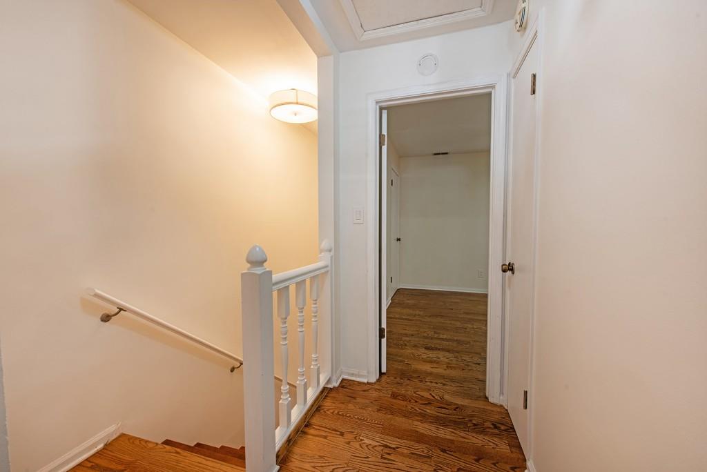 408 Sycamore Drive, Unit D Decatur, GA 30030 - Photo 22 of 63 a view of hallway with stairs and wooden floor
