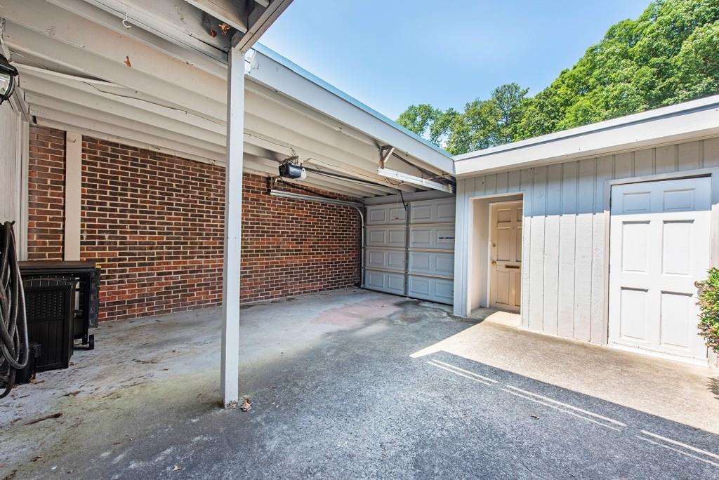 408 Sycamore Drive, Unit D Decatur, GA 30030 - Photo 28 of 63 a view of a house with a garage