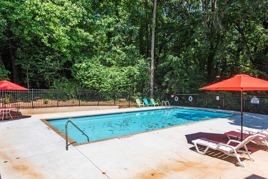 408 Sycamore Drive, Unit D Decatur, GA 30030 - Photo 33 of 63 a view of a backyard with swimming pool and sitting area