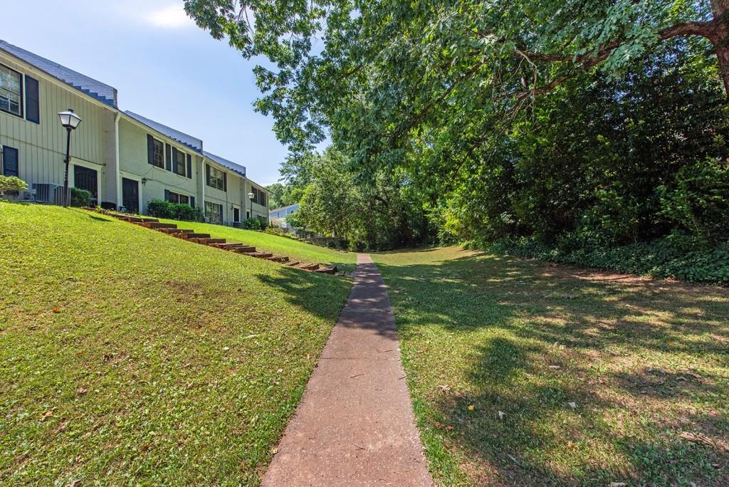 408 Sycamore Drive, Unit D Decatur, GA 30030 - Photo 34 of 63 a view of a pathway with a yard