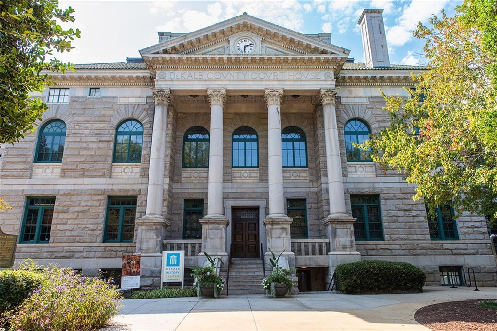 408 Sycamore Drive, Unit D Decatur, GA 30030 - Photo 45 of 63 front view of a brick house with a small yard