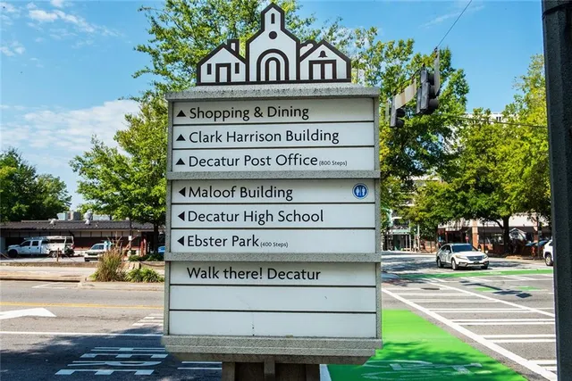 a view of a swimming pool with a big yard