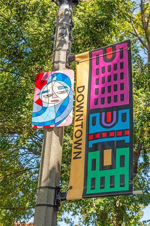 408 Sycamore Drive, Unit D Decatur, GA 30030 - Photo 58 of 63 a sign that is on the side of a building