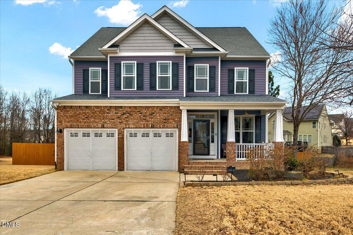 454 Big Willow Way Rolesville, NC 27571 - Photo 1 of 50 a front view of a house with a yard