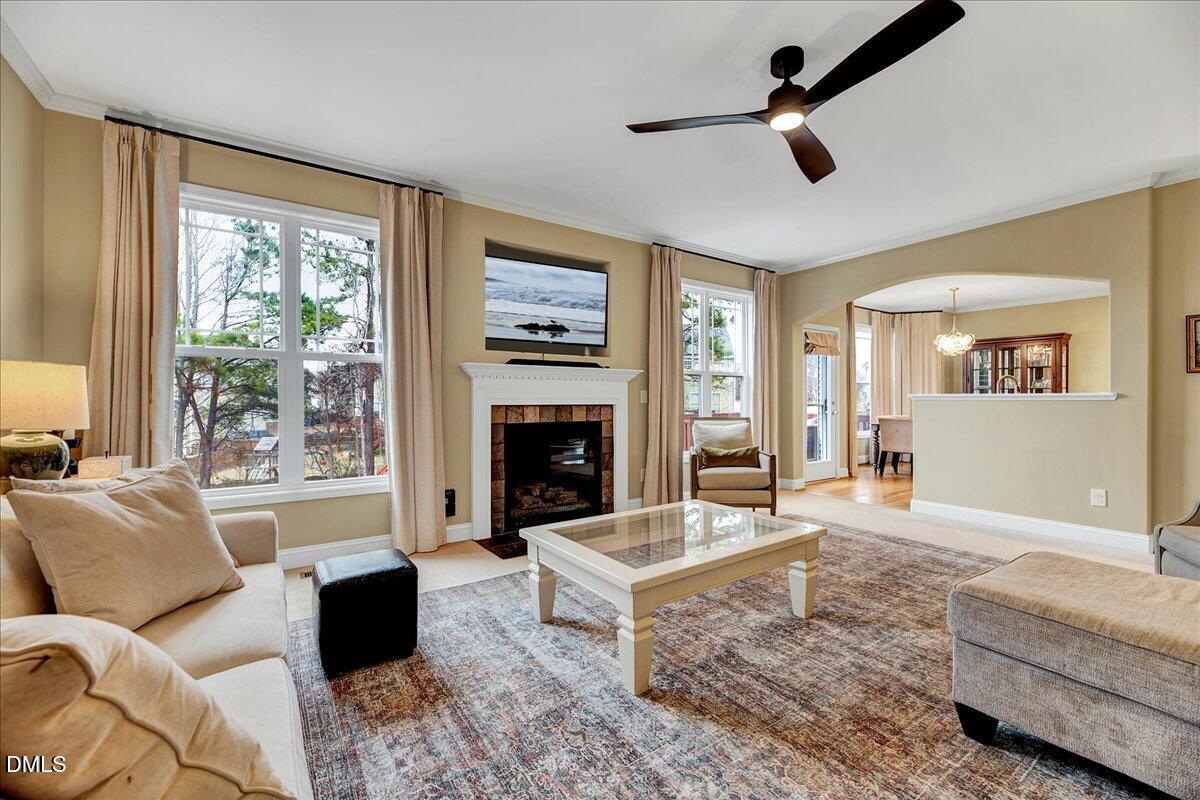 454 Big Willow Way Rolesville, NC 27571 - Photo 21 of 50 a living room with furniture and a fireplace