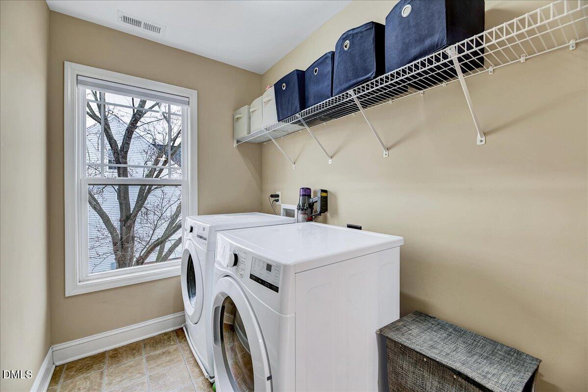 454 Big Willow Way Rolesville, NC 27571 - Photo 28 of 50 a utility room with dryer and washer