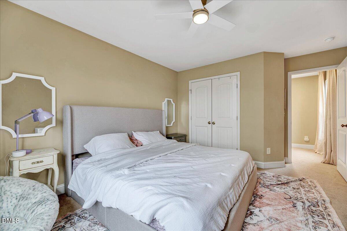 454 Big Willow Way Rolesville, NC 27571 - Photo 33 of 50 a bedroom with a bed and a window