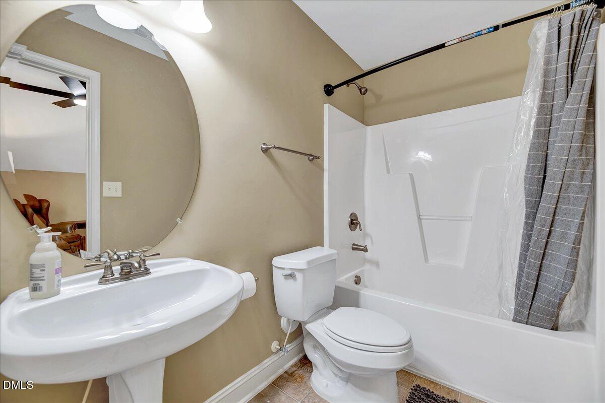 454 Big Willow Way Rolesville, NC 27571 - Photo 34 of 50 a bathroom with a sink toilet and shower