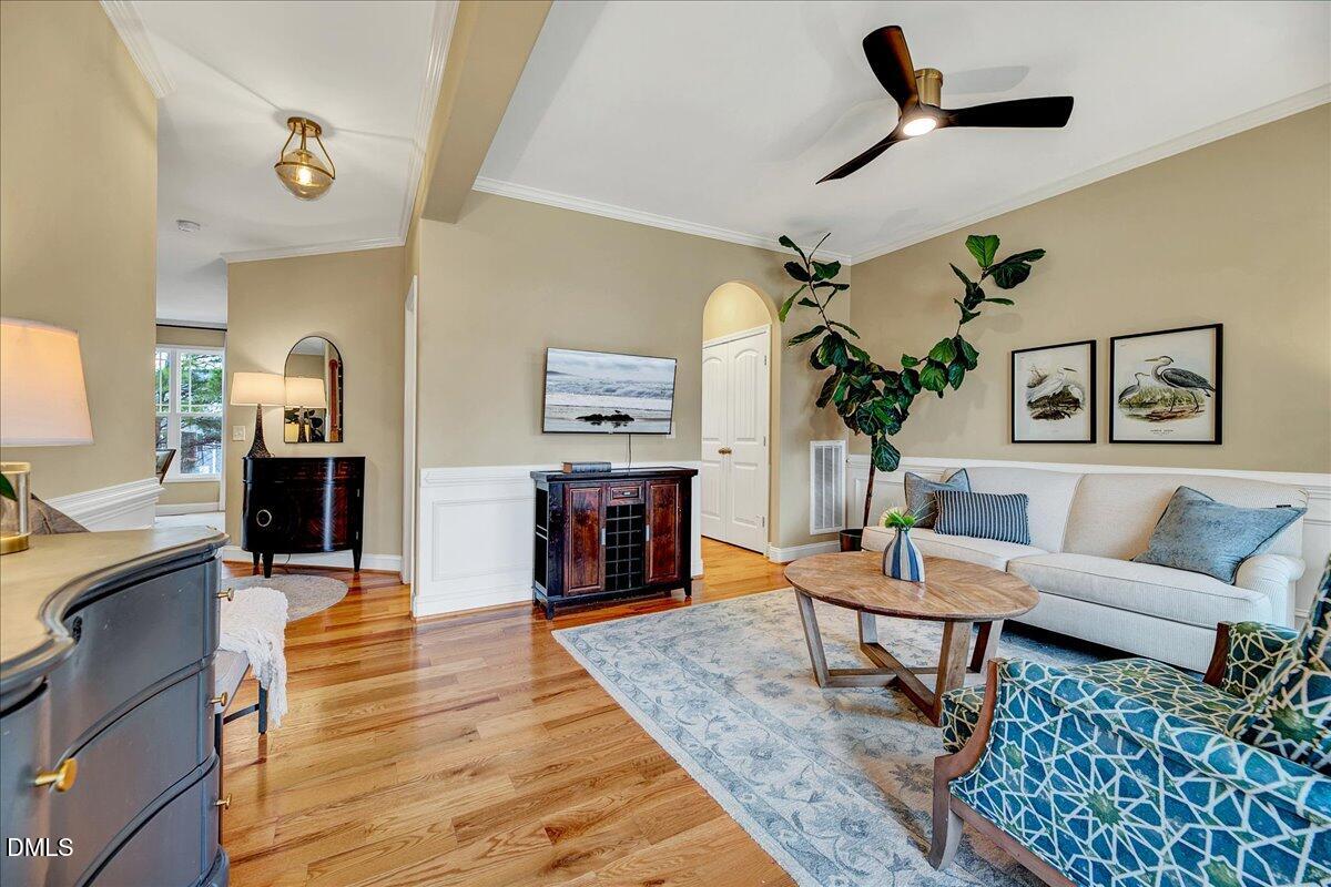 454 Big Willow Way Rolesville, NC 27571 - Photo 7 of 50 a living room with furniture and a fireplace