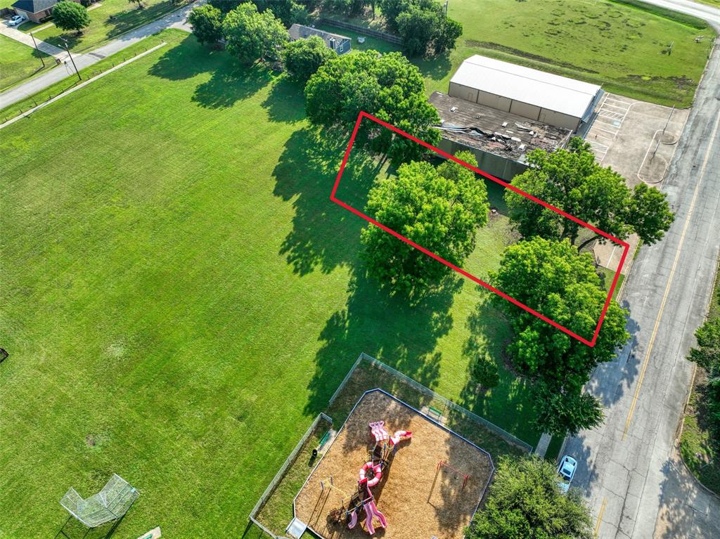 723 East Main Street Lancaster, TX 75146 - Photo 4 of 11 an aerial view of residential houses with outdoor space and trees