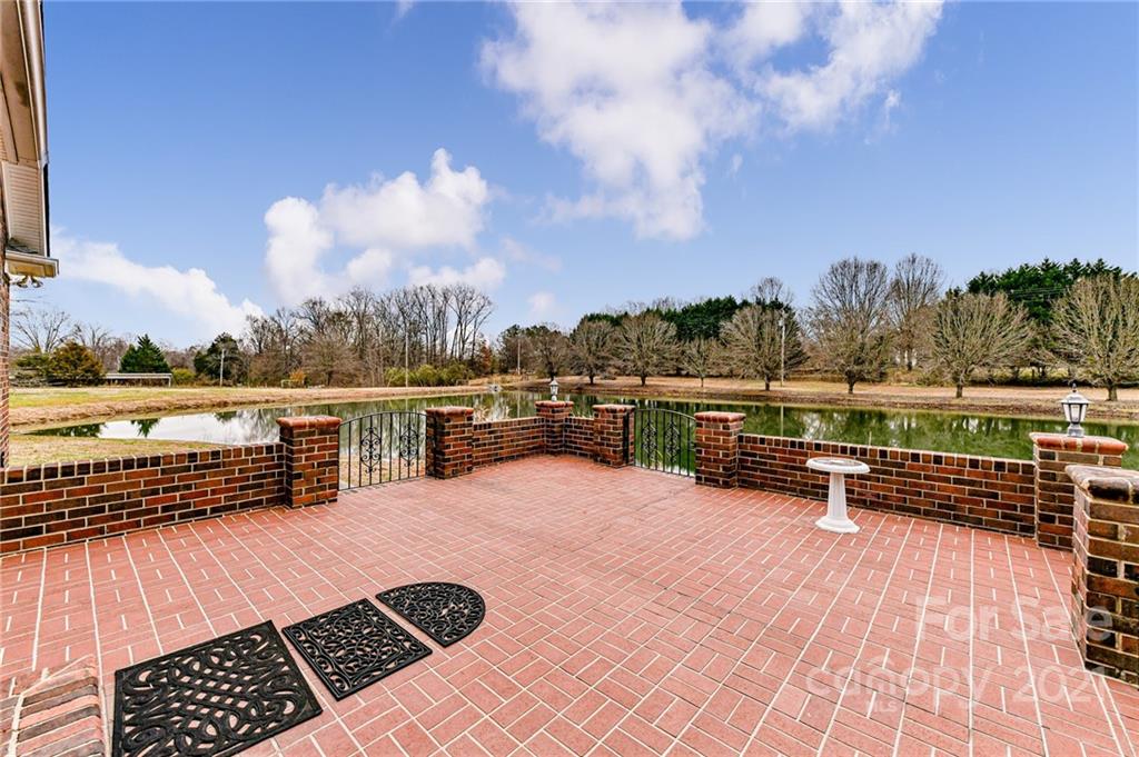 4014 Love Mill Road Monroe, NC 28110 - Photo 12 of 16 a view of a terrace with outdoor seating