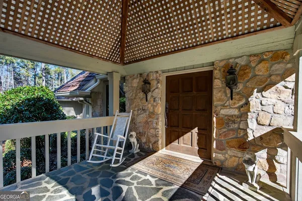 a balcony view with a furniture