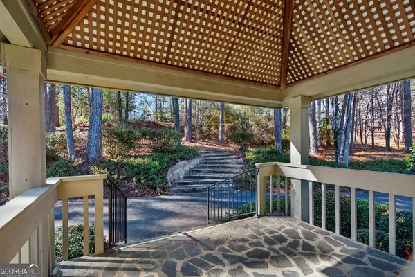 a view of a porch with furniture