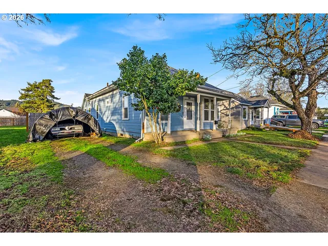 a house view with a garden space