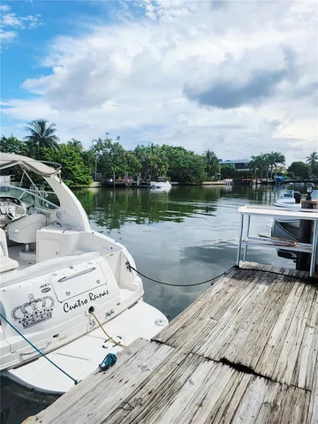 a view of a lake with sitting area