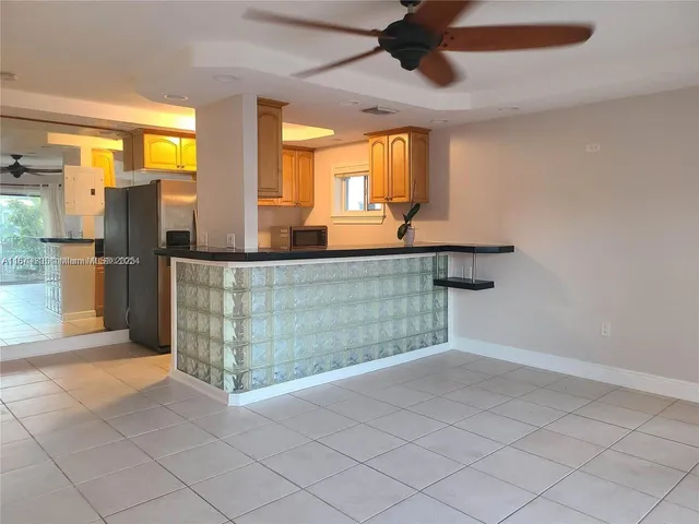 a view of a kitchen with a sink