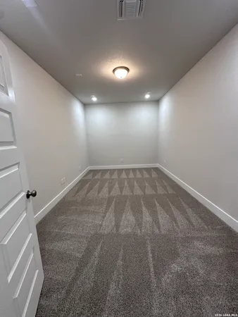 an empty room with a natural light