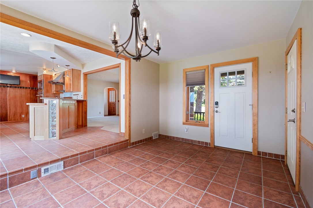 1213 State Road Webster, NY 14580 - Photo 11 of 38 The dining area to the kitchen