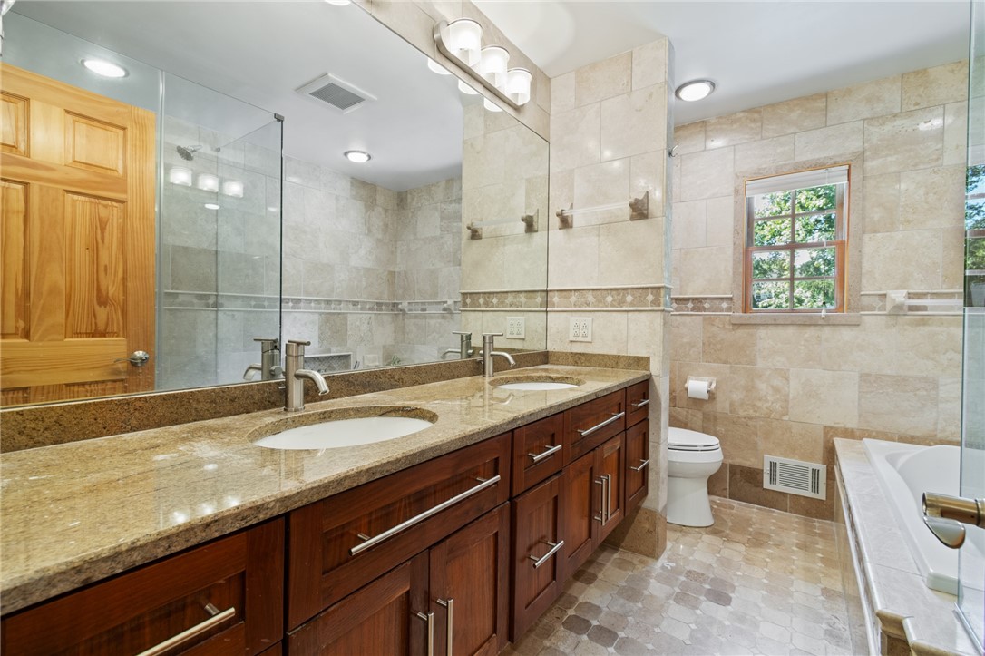 1213 State Road Webster, NY 14580 - Photo 21 of 38 This bathroom is a MUST SEE! Jacuzzi style tub- gr