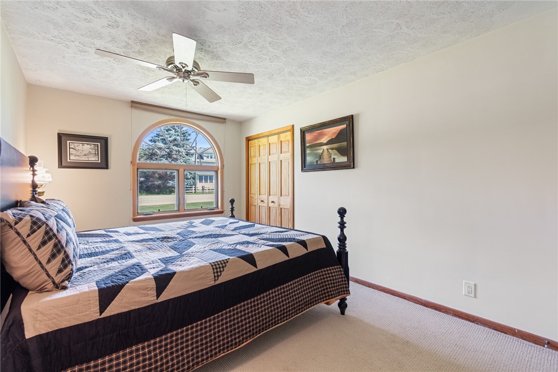 1213 State Road Webster, NY 14580 - Photo 25 of 38 Note the arched windows on this primary bedroom