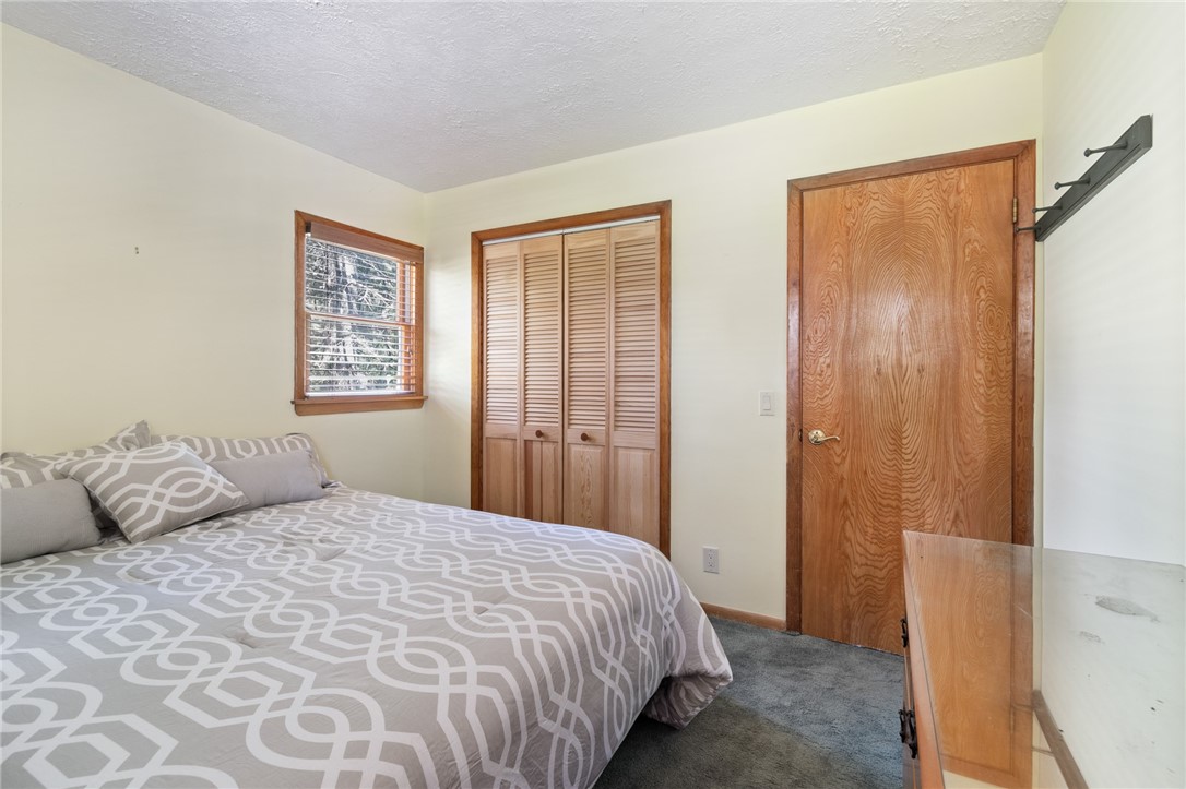 1213 State Road Webster, NY 14580 - Photo 27 of 38 One of the three bedrooms - LOTS of closet space