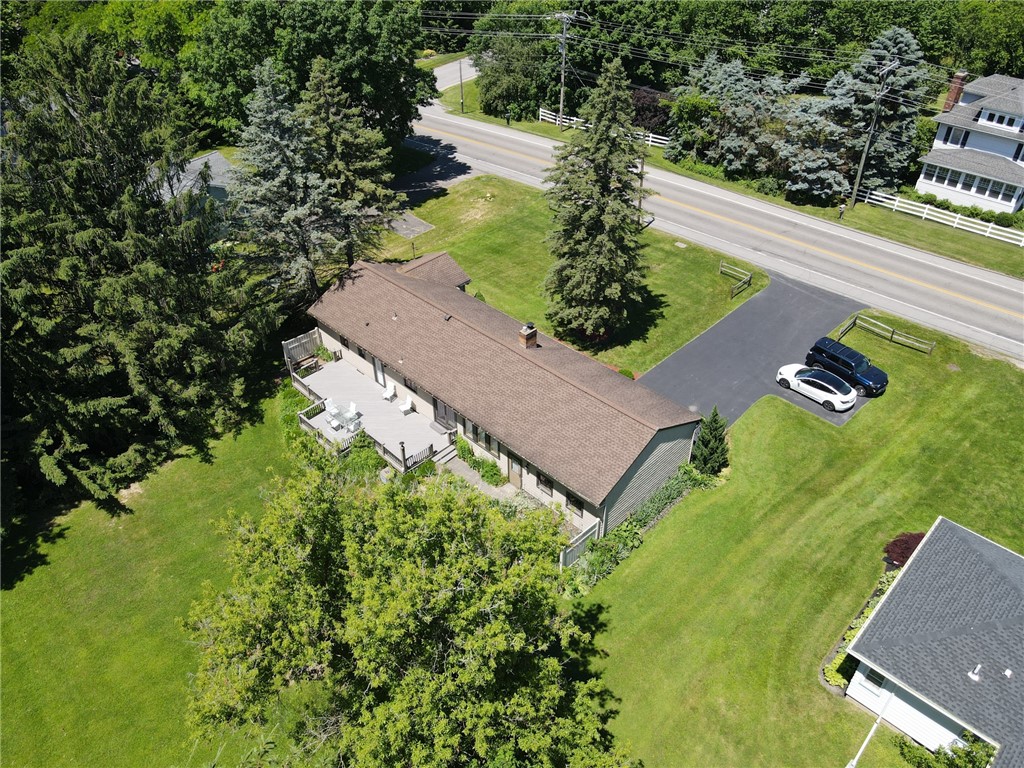 1213 State Road Webster, NY 14580 - Photo 3 of 38 The HUGE deck - completes the rear of the home