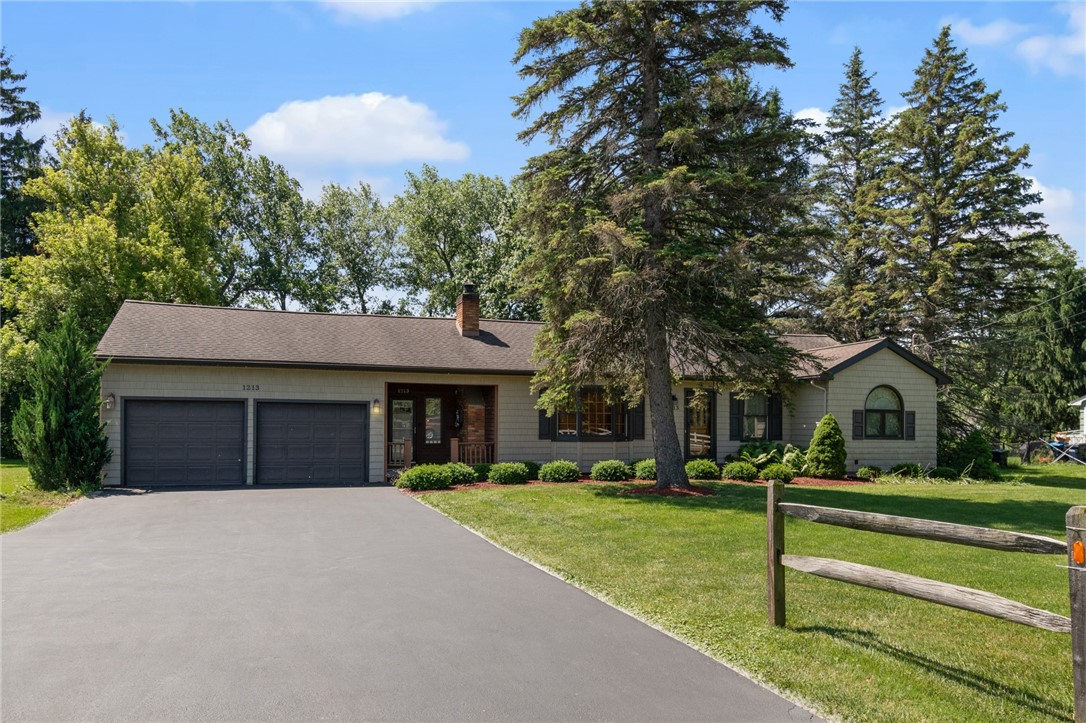1213 State Road Webster, NY 14580 - Photo 34 of 38 2 + car garage that’s insulated! Double wide drive