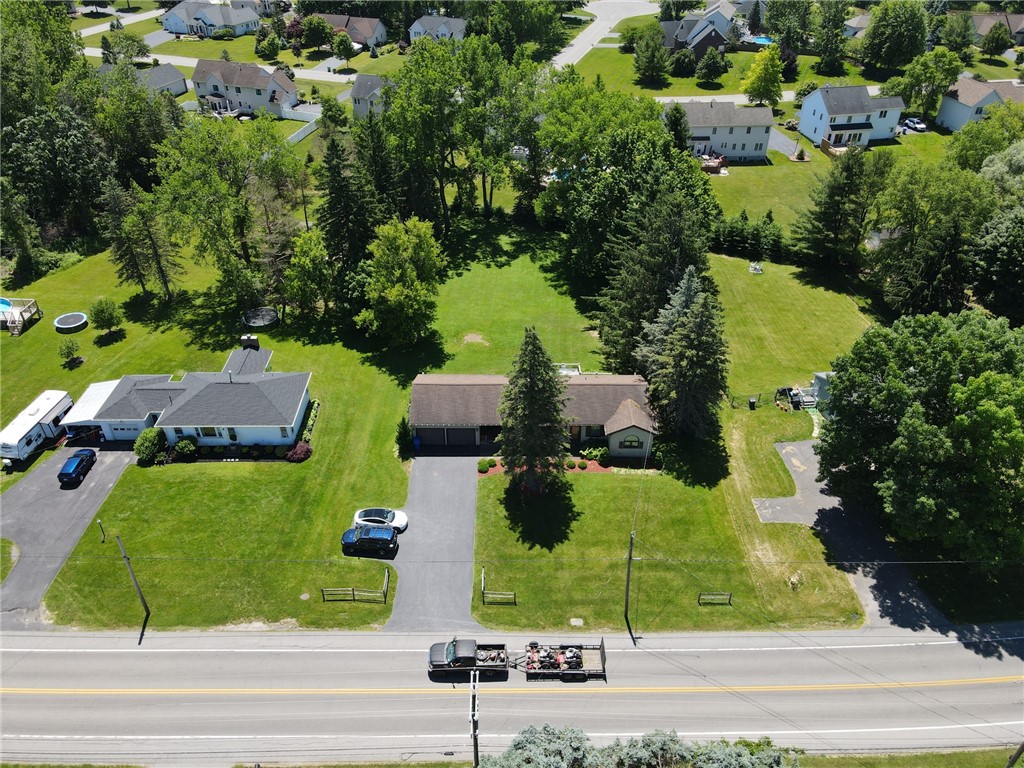 1213 State Road Webster, NY 14580 - Photo 37 of 38 Private yard- surrounded by trees