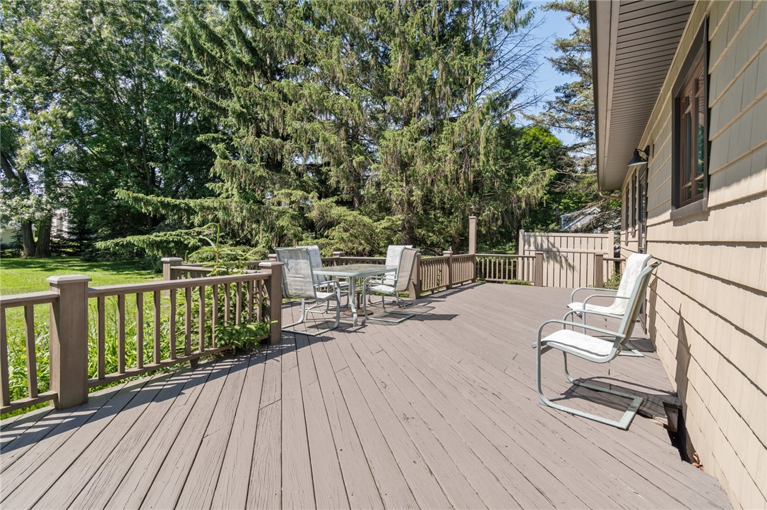 1213 State Road Webster, NY 14580 - Photo 4 of 38 The rear deck- a great place to welcome the day