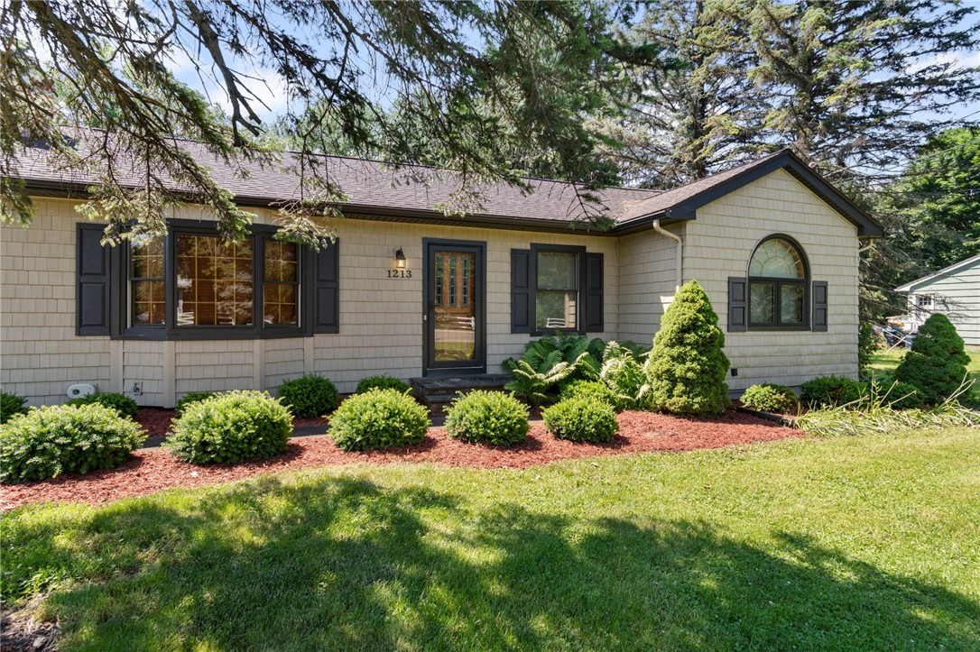 1213 State Road Webster, NY 14580 - Photo 5 of 38 The fresh landscaping- all ready for summer!