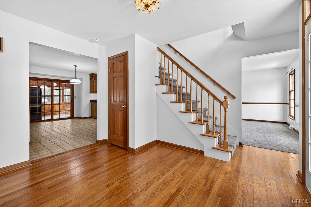 2788 Hiltonwood Road Lysander, NY 13027 - Photo 11 of 50 Entry way with hardwoods with two coat closets!