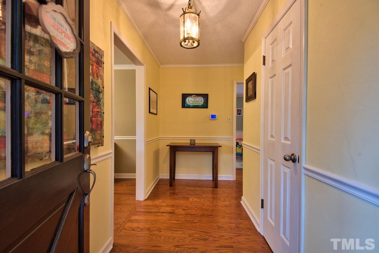 208 Latta Road Durham, NC 27712 - Photo 2 of 25 Welcome Home! Nice hardwood floors at the entry and throughout several rooms.