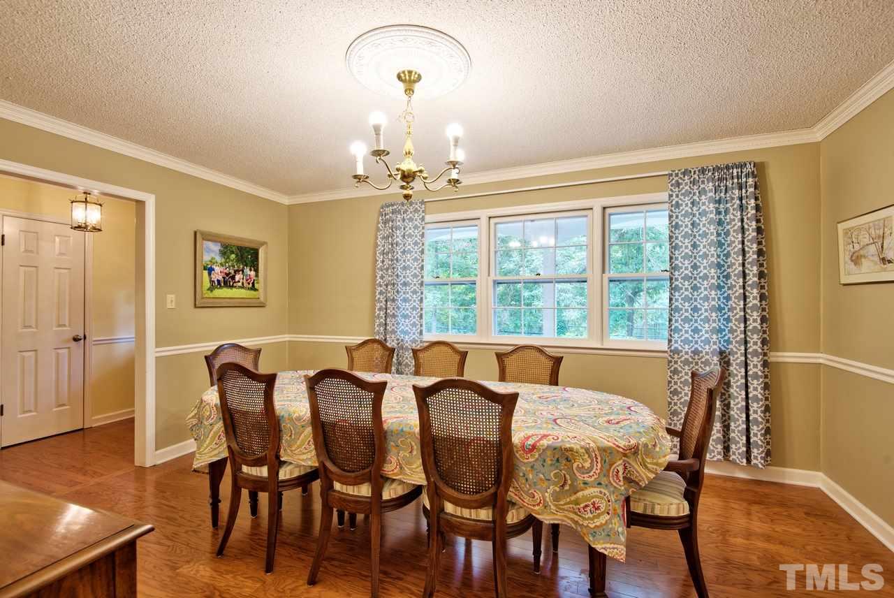 208 Latta Road Durham, NC 27712 - Photo 4 of 25 The Dining Room has a large picture window and warm inviting wall color.