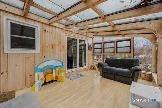 9 Thompson Road Franklin, CT 06254 - Photo 12 of 30 a living room with furniture and a window