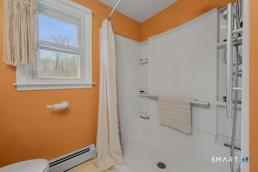 9 Thompson Road Franklin, CT 06254 - Photo 13 of 30 a bathroom with a bathtub