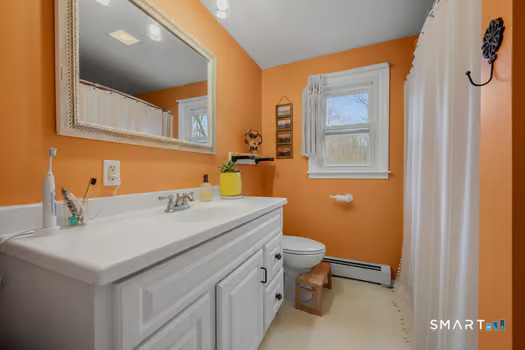 9 Thompson Road Franklin, CT 06254 - Photo 14 of 30 a bathroom with a sink and a toilet