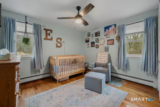 9 Thompson Road Franklin, CT 06254 - Photo 15 of 30 a bedroom with a bed and a couch