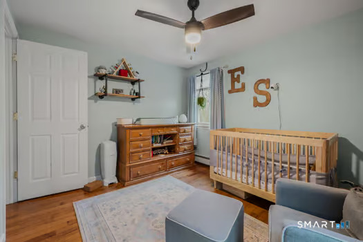9 Thompson Road Franklin, CT 06254 - Photo 17 of 30 a bedroom with furniture and a window