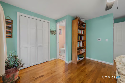 9 Thompson Road Franklin, CT 06254 - Photo 20 of 30 a view of empty room with wooden floor and closet
