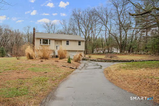 9 Thompson Road Franklin, CT 06254 - Photo 2 of 30 a view of a yard with a house