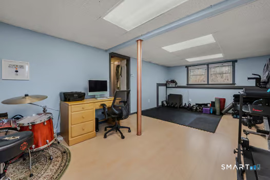 9 Thompson Road Franklin, CT 06254 - Photo 22 of 30 a view of a workspace with furniture and toys