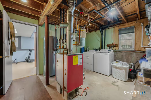 9 Thompson Road Franklin, CT 06254 - Photo 24 of 30 a utility room with dryer and washer