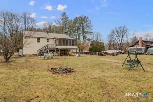 9 Thompson Road Franklin, CT 06254 - Photo 25 of 30 a view of a yard with a house