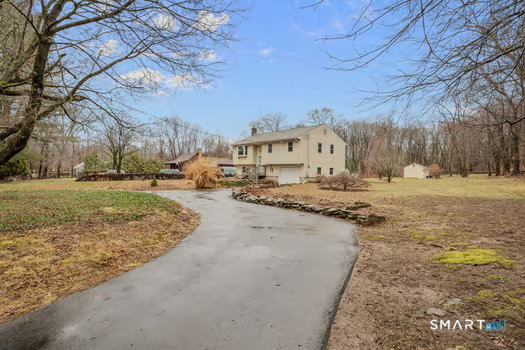 9 Thompson Road Franklin, CT 06254 - Photo 3 of 30 a view of a yard with snow on the road