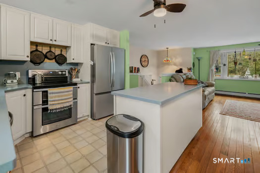 9 Thompson Road Franklin, CT 06254 - Photo 10 of 30 a kitchen with a sink appliances and cabinets